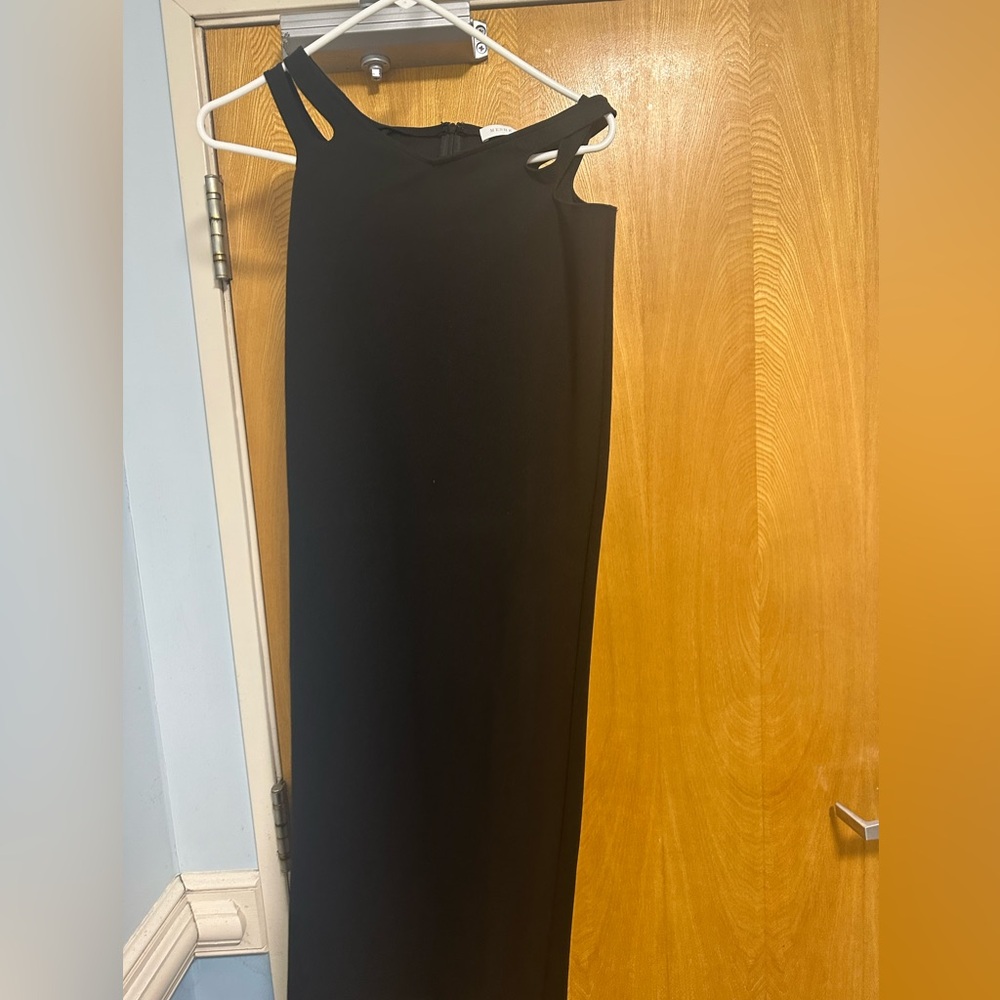 Meshki Black cutout waist long skirt with matching cutout halter top.